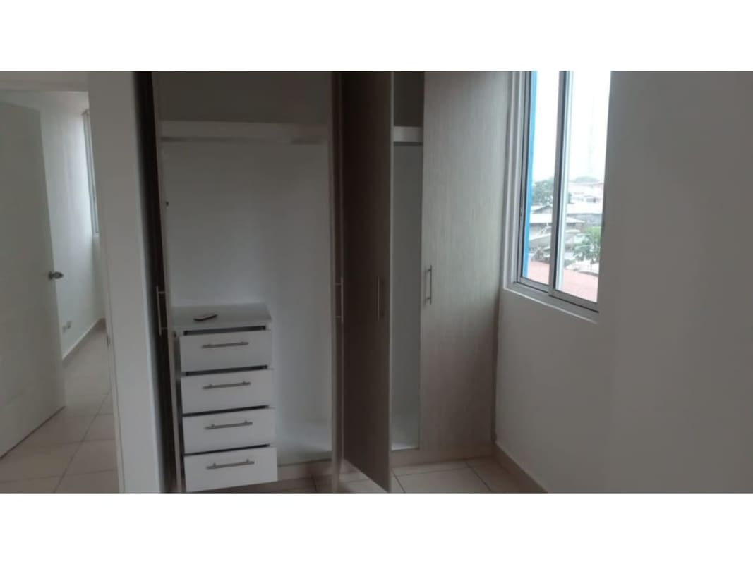 Bedroom with tiles, built-in closet, bright window in Residencial Las Palmeras Panama City