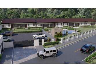 Gated townhouse community with landscaped pool and green areas Nueva Gorgona Panama