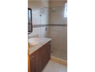 Covered terrace and upper balcony overlooking garden Playa Malibu Nueva Gorgona Panama