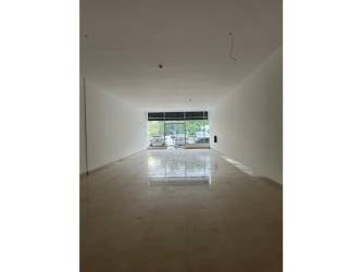 Ground floor retail unit with glass front, tiled floor on busy Avenida La Pulida Panama West