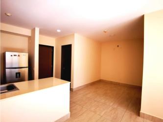 Bedroom featuring mountain views from window, split AC, built-in closet in PH River Valley Panama Pacifico apartment