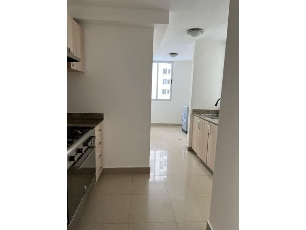 Bright kitchen space with granite top and wood cabinets PH Rokas Condado del Rey Panama