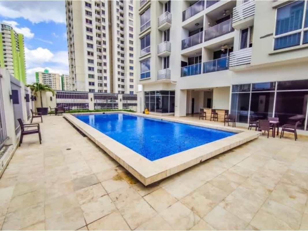 Swimming pool, lounge areas and towers of PH Rokas Condado del Rey