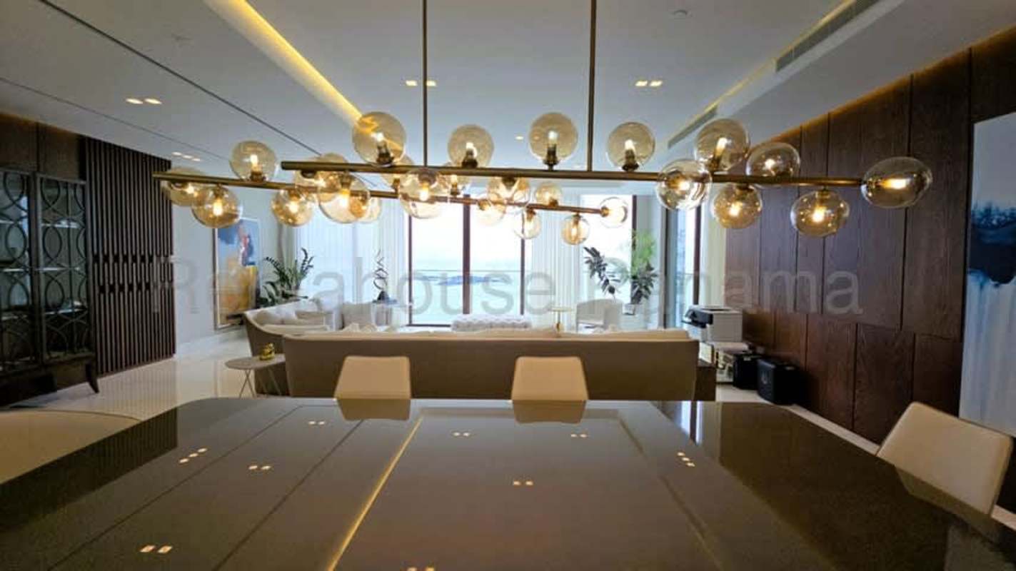 Luxurious master bedroom with floor-to-ceiling windows and ocean view Punta Pacífica Panama