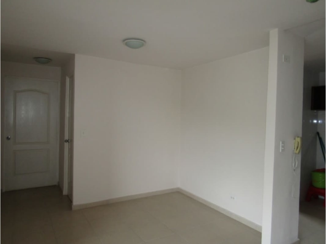 Spacious tile-floored living and dining area with access to balcony PH Mallorca Park Los Andes Panama