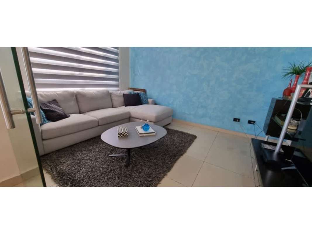 Modern bedroom with large windows and city view PH Mandarin Bay San Francisco Panama