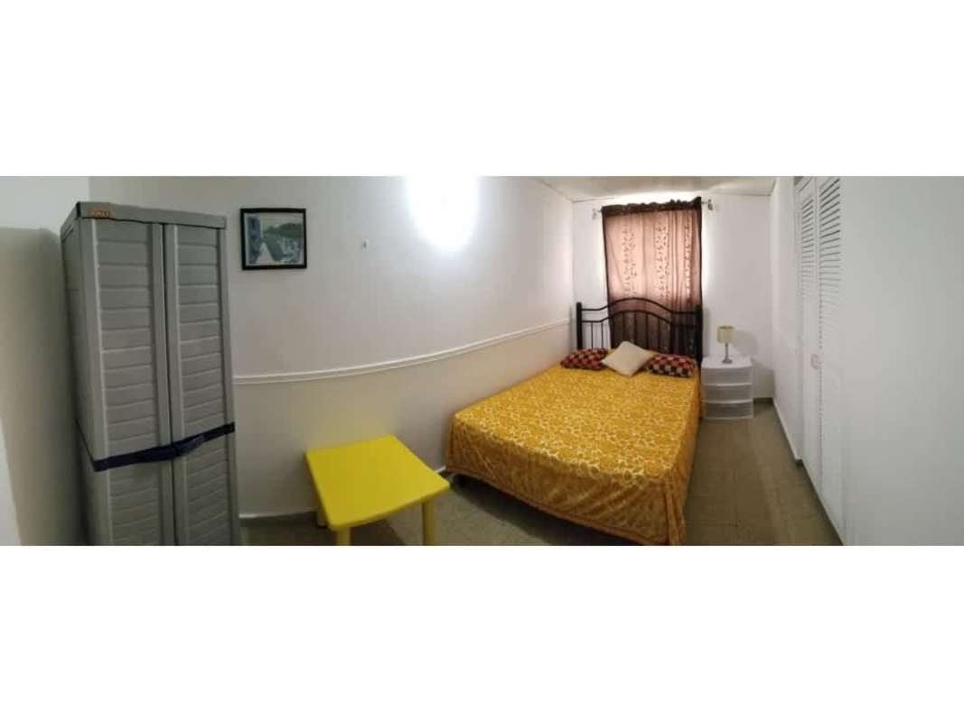 Bedroom with air conditioning, built-in closets, ceramic tile floor in Reparto Nuevo Panamá house