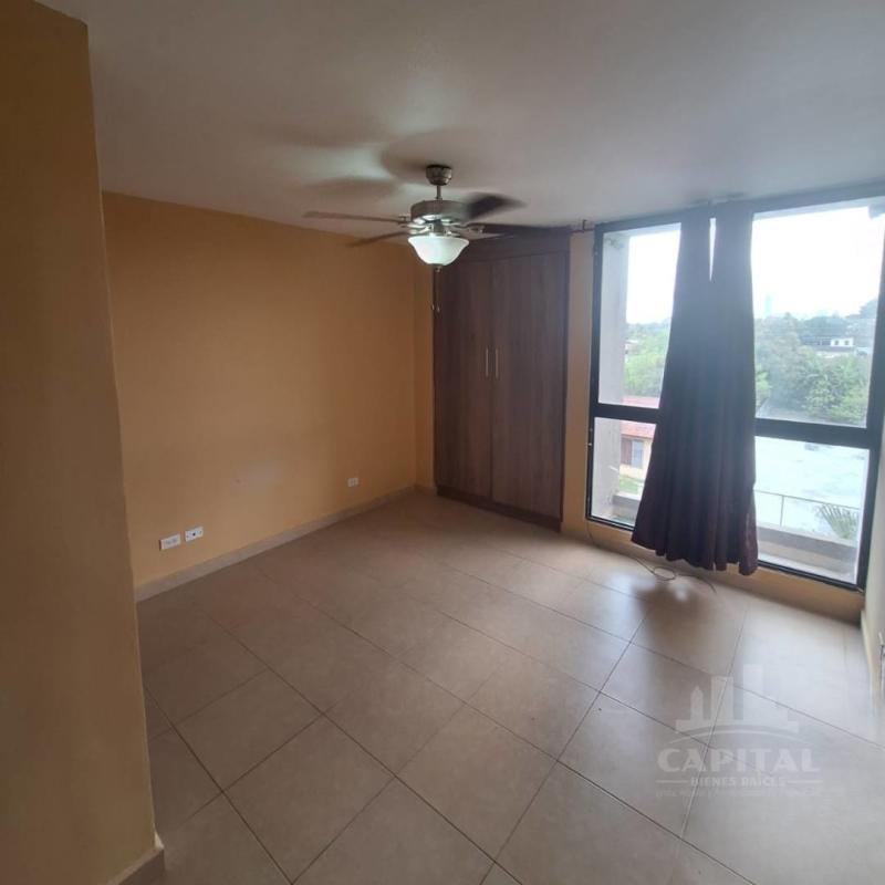 Kitchen with granite countertops, cabinetry and laundry nook in PH Villa Andalucía Las Acacias Panama