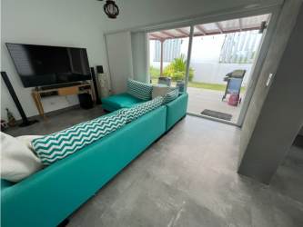 Open kitchen with granite countertops and appliances in Villa Mamey Punta Barco pool villa