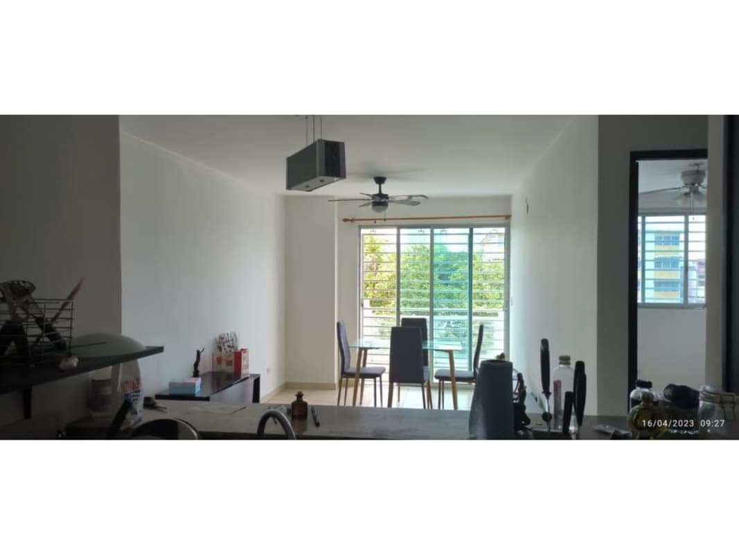 Interior entryway with metal decorative security gate and solid door in PH Segovia Park Panama