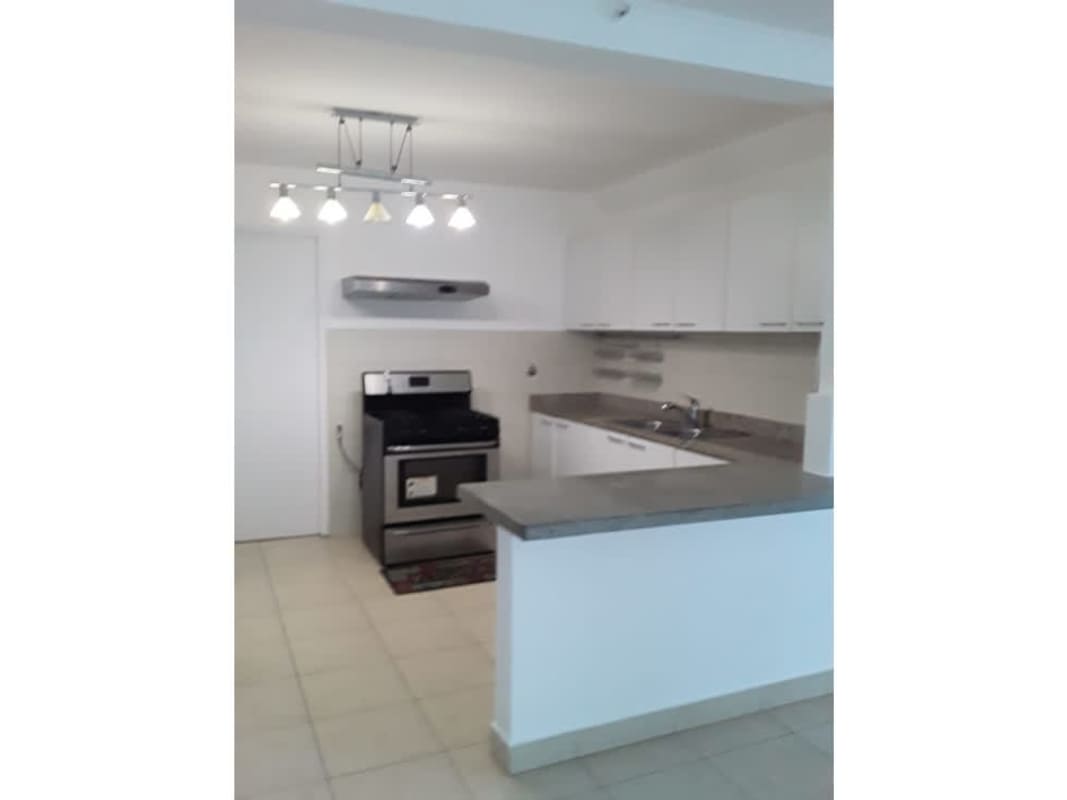 Kitchen with ceramic backsplash, cabinetry and open concept in PH Deluna Park View Villa de las Fuentes Panama