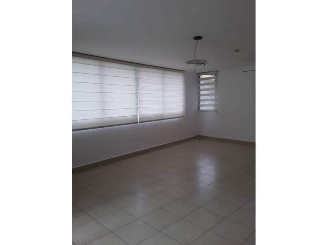 Spacious open plan living dining room with tile floors in PH Deluna Park View Panama