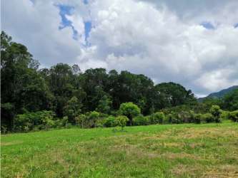 Countryside open area with trees mountain backdrop farmland Bejuco for sale