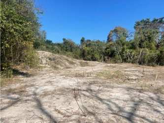 Sandy flat development lot with dense forest edge inside PH Costa Esmeralda Panama