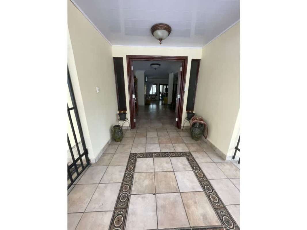 Wood cabinetry kitchen with granite counters, appliances in La Alameda Betania Panama