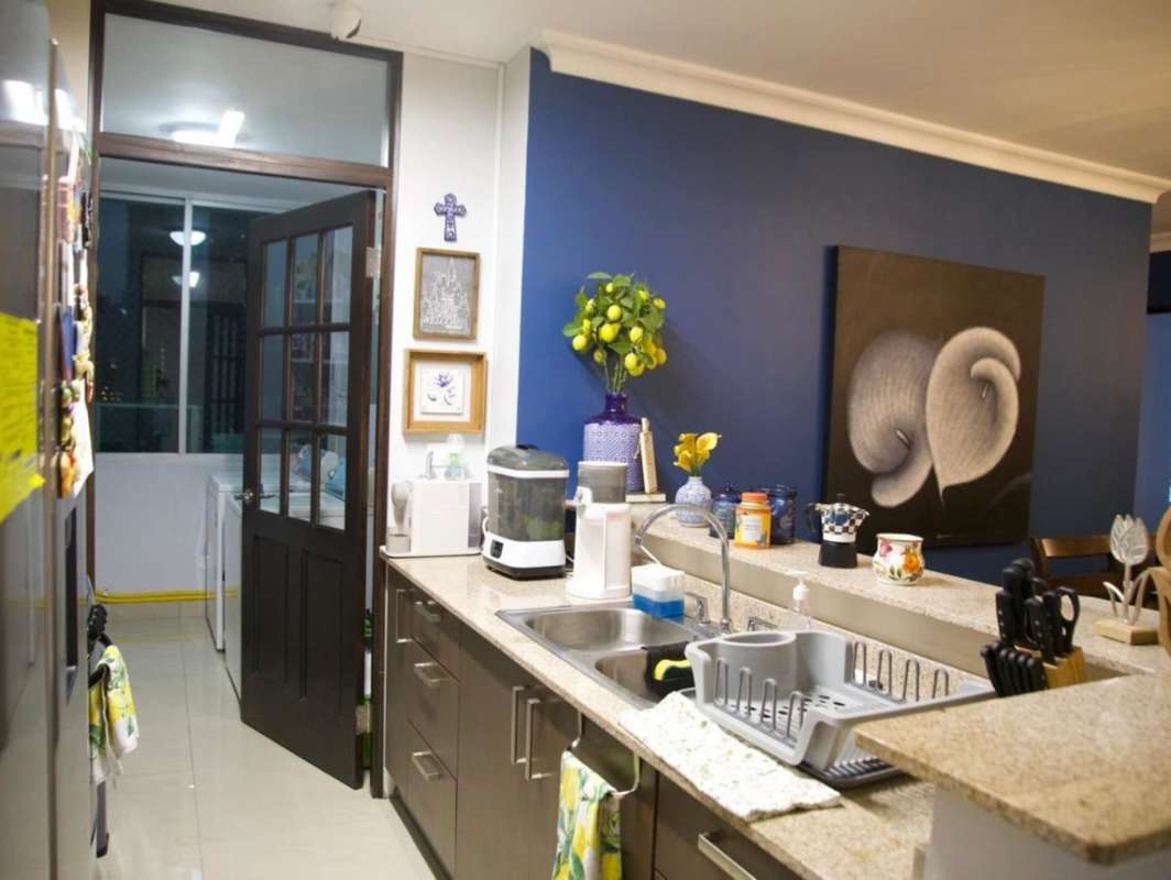 Open living dining area with city view balcony in PH Pacific Sun Punta Pacifica