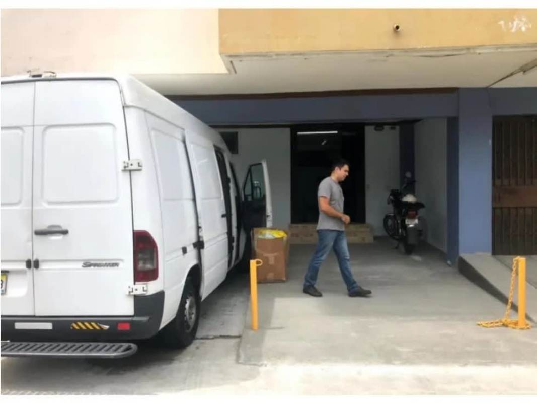 Covered parking with van in front of ground floor commercial space Santa Elena Panama