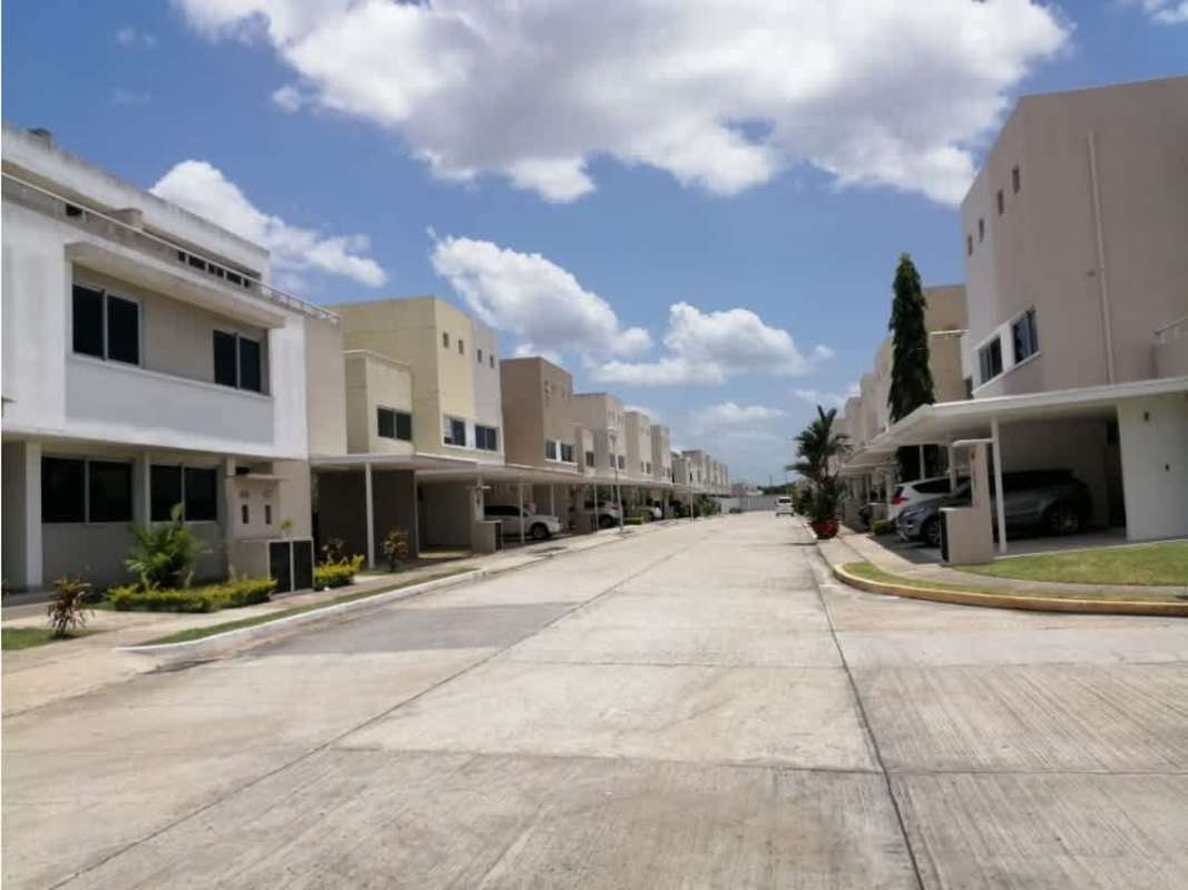 Exterior contemporary townhouse complex with driveways and carports Costa Sur Village Panama