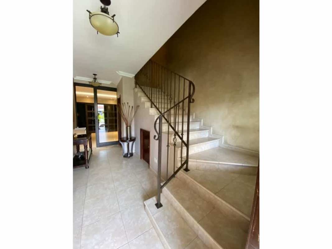 Foyer with iron railing staircase, glass doors Palmeras del Este Costa del Este Panama
