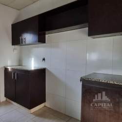 Modern kitchen with granite countertop in Villas del Sol house Arraiján Panama