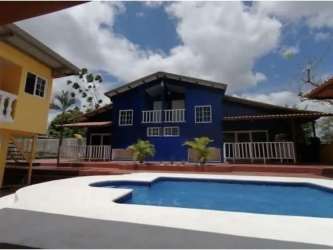Basic kitchen with window, freestanding stove and sink at beach rental Gorgona Panama
