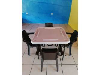 Colorful children's playset swing set and slide at fenced yard Gorgona beach rental