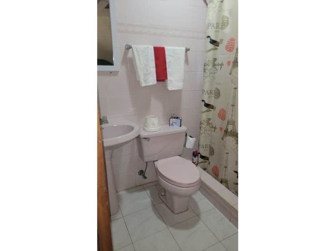 Landscape garden with colorful flowers and hill view at mountain estate Cerro Azul Panama