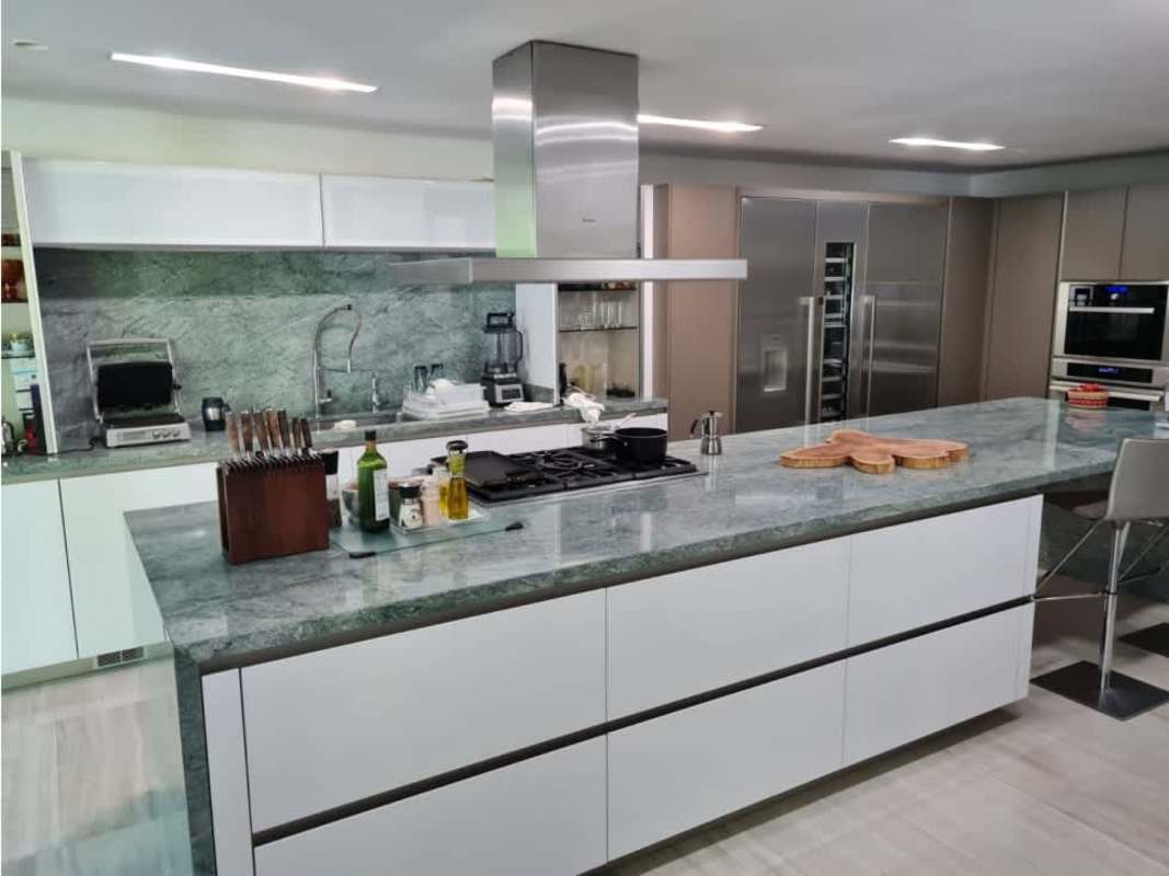 Contemporary kitchen marble surfaces stainless appliances PH Costa Esmeralda Costa Sur Panama