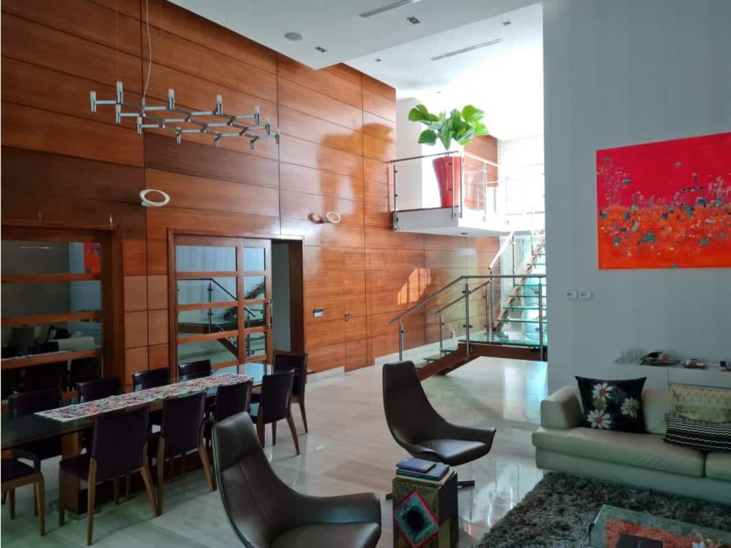 Covered outdoor terrace furnished facing swimming pool in PH Costa Esmeralda Costa Sur