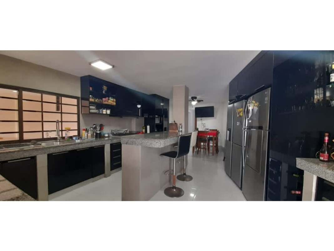 Contemporary kitchen with granite countertops appliances wood cabinets El Bosque Altos de la Montaña Panama Hola Realty