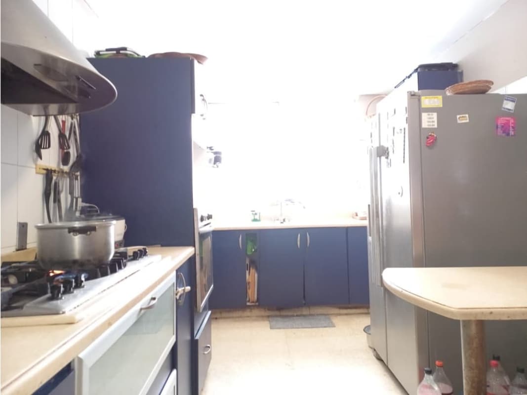 Functional kitchen blue cabinets gas stove PH Santa Fe El Carmen Panama City