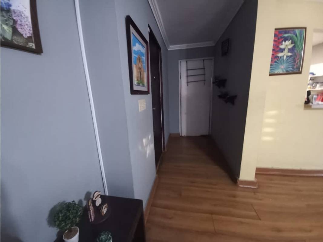 Entry hallway with wood flooring and artwork PH Santa Fe El Carmen Panama