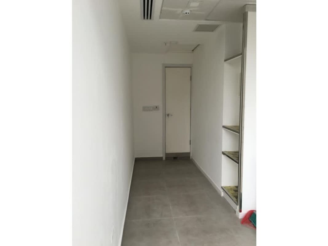 Modern glass facade of Sortis Business Tower in Obarrio Panama City banking district