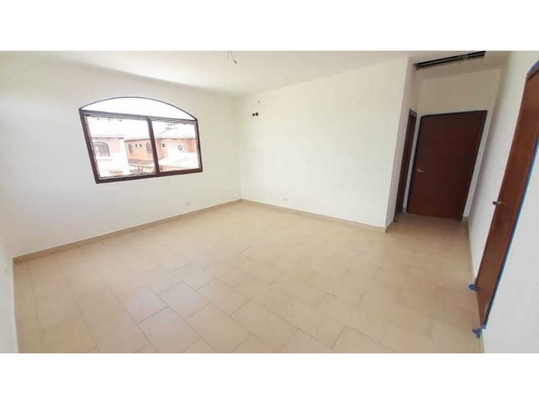 Spacious empty living room with large windows and tiled floors in El Doral Costa Sur Panama City