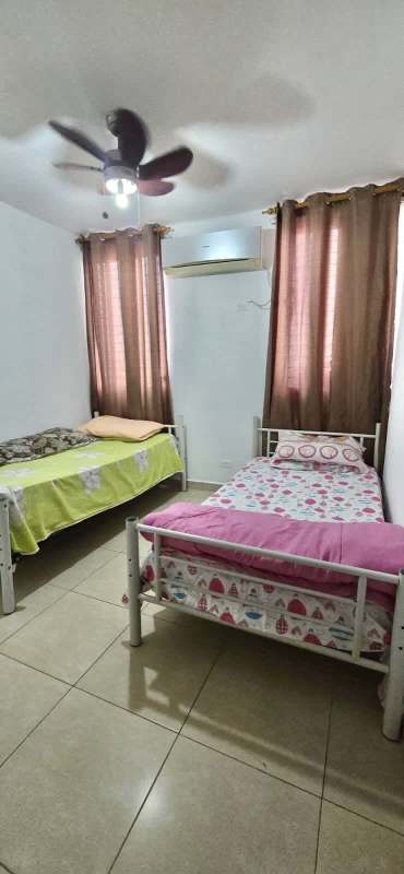 Furnished bedroom with closet, air conditioning, ceiling fan in PH Victory Tower Panama