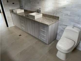 Mediterranean architecture with red tile roof over courtyard area in Hacienda Pacífica Panama