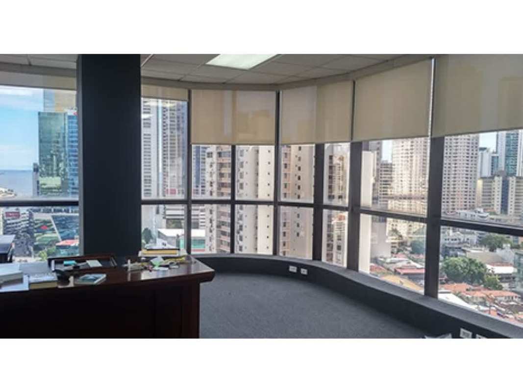 Bright executive office with floor to ceiling windows and city skyline view Calle 50 Panama