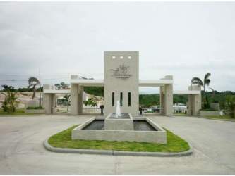 Modern furnished living room with sofa, AC and decor at The Village Beach & Residences San Carlos Panama