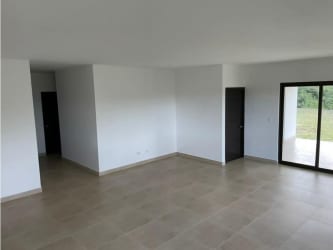 Bright open concept living dining room in new Panama country house for sale