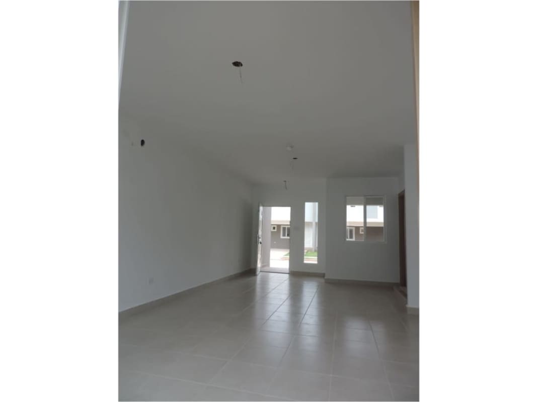 Open living dining room with tiled floors PH Victoria townhouse Panama City
