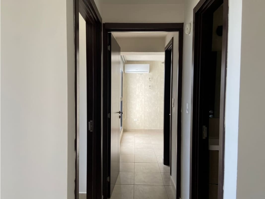 Bright living-dining space tile floors balcony city view PH Vista Verde Panama