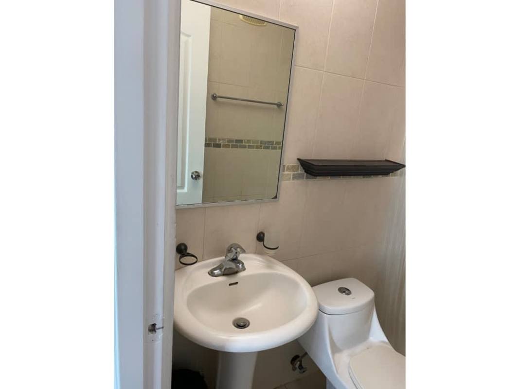 Bathroom modern tile walk-in shower pedestal sink PH Green Point Panama