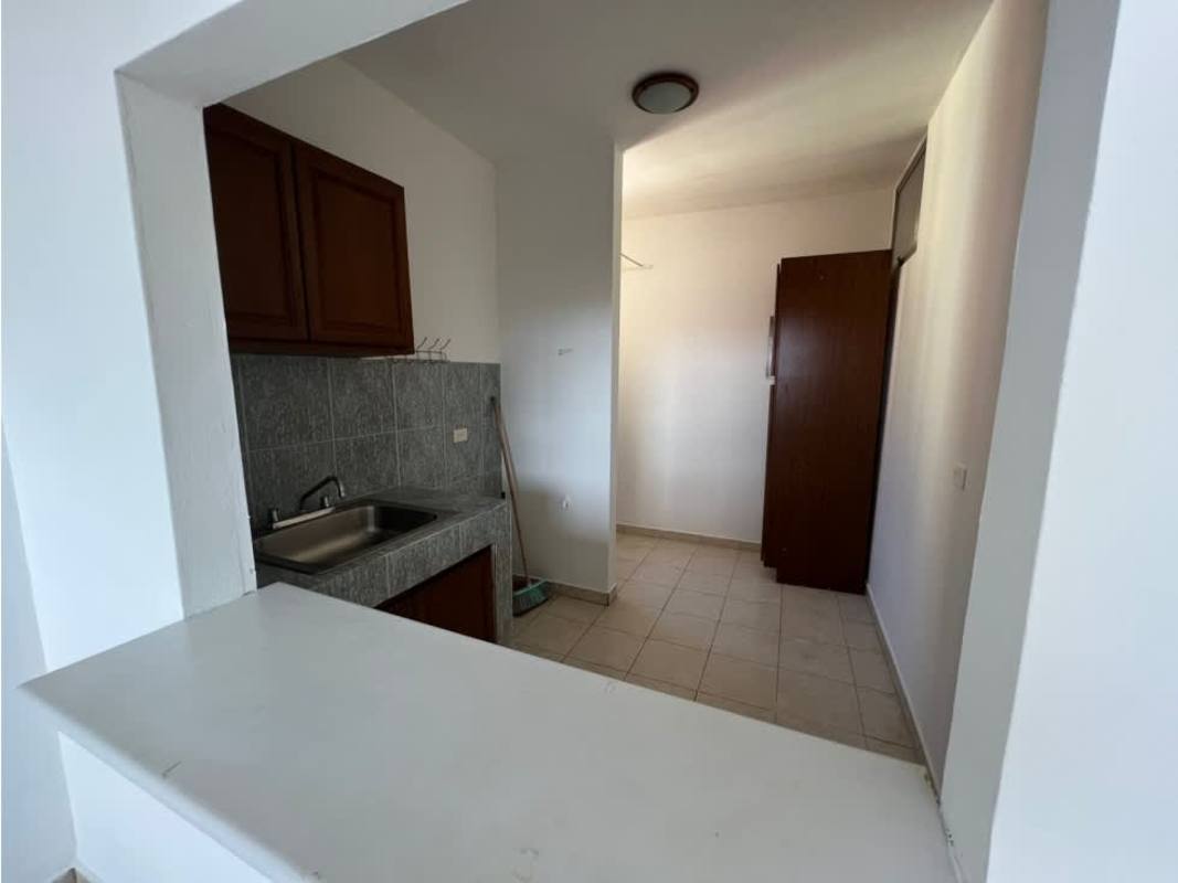 Bedroom with tile floor and large window PH Mystic Gates Panama City