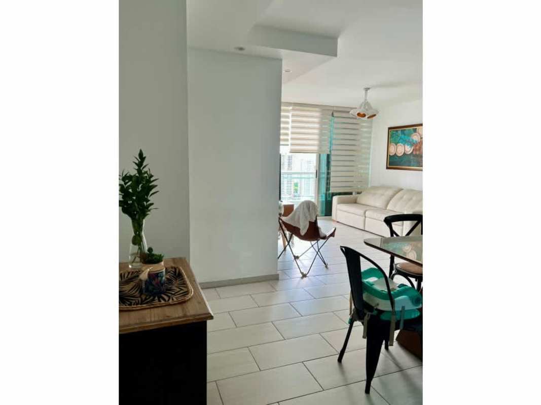Tile-floored living and dining area with large window PH The Towers San Francisco Panama