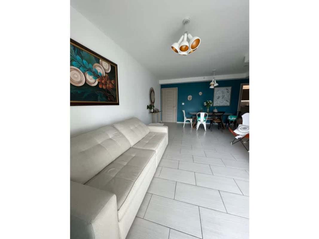 Bathroom with glass shower, gray tiles, large mirror PH The Towers San Francisco Panama
