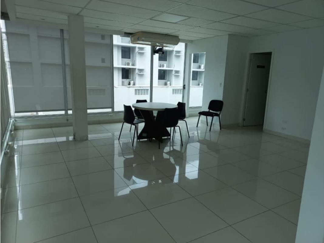 Bright furnished commercial office interior with white tiles and natural light in PH Neo Plaza Panama