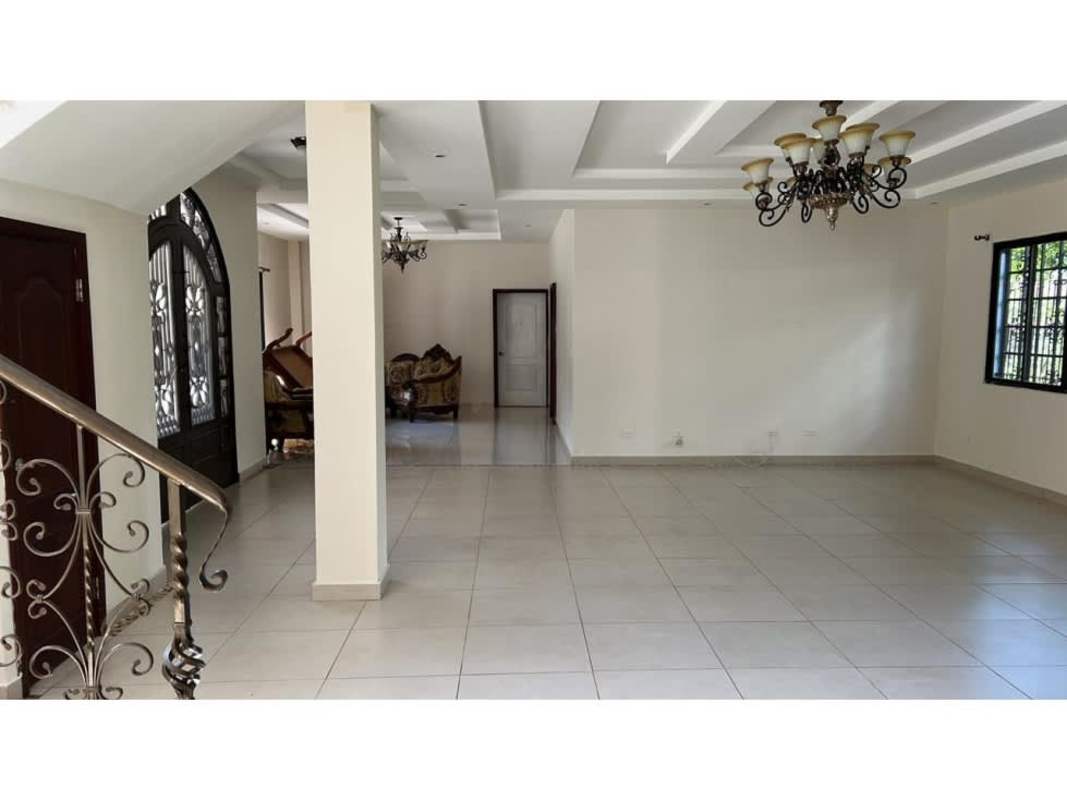 Mediterranean staircase with wrought iron railing and tile floor in Ancon Panama