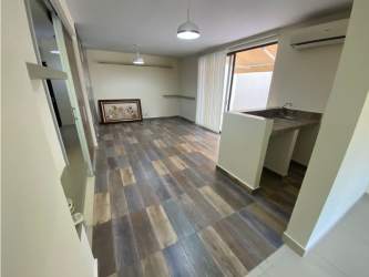 Spacious bedroom with balcony, built-in closet and AC outlet in River Valley Panamá Pacífico home