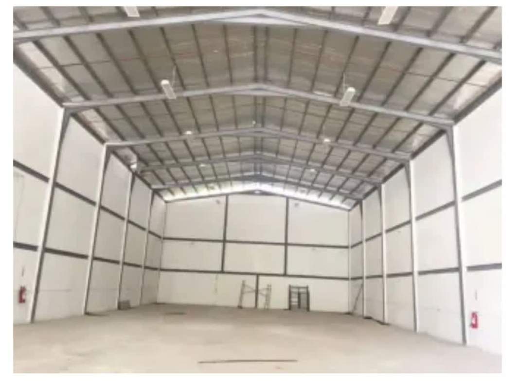 Interior of empty industrial warehouse with high ceiling and concrete floor Rio Abajo Panama