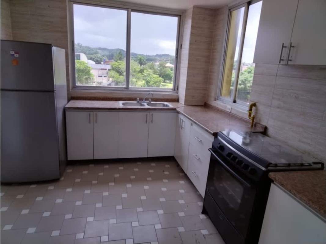 Kitchen with fridge, oven, large windows, granite counters in PH Montecarlo El Dorado